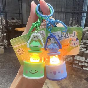 Creative cartoon genuine outdoor camping light frog doll keychain, cute girl pig backpack keychain