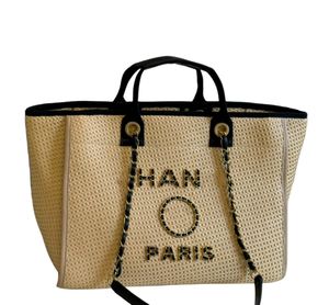 منسوجة القش المنسوجة شاطئ حقيبة مصممة حقيبة شاطئية ليديس رسالة رفاهية حقيبة تسوق نساء