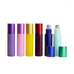 Bottiglie di stoccaggio 24pcs/lotto da 10 ml Crema Crema Blu/Verde/Viola/Red/Rosa/Giallo Rolto di vetro su Small Olio Essenziale campione