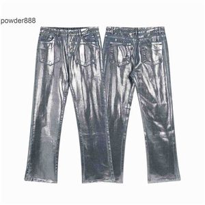 2024 Summer New High Street Fashion Brand Blue Blue Silver Laser Leisure Micro Elastic jeans per uomini e donne