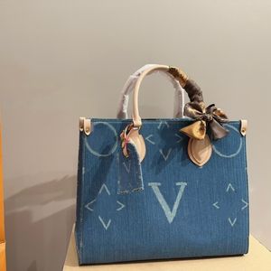 24SS Women's Luxury Designer Denim Tote Bag Läder Shoppingväska Kvinnor Tote axelväska shoppingväska mamma väska delikat vintage stor kapacitet 35 cm