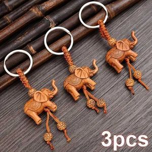 Keychains Lanyards Elephant Keychain Peach Wood Carving Riches Lucky Animal Key Chain Pendant Women PA i POM CHARM HEM KEY RINGS 1-3PCS D240417