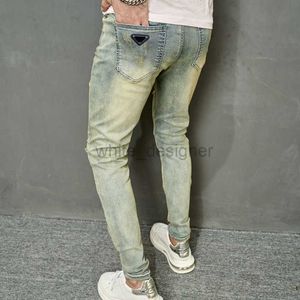 Designer jeans för män Nya herrar smala passform elastiska små raka ben jeans personliga modemän byxor trend mode pant