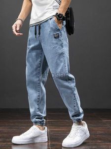 Jeans maschile primavera estate nera blu blu uomo streetwear jogger pantaloni da jogger baggy harem jean pantaloni plus size 6xl 7xl 8xl d240417