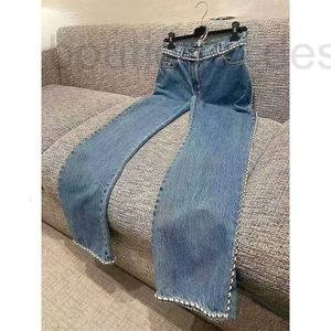 Damskie dżinsy projektantki nowa moda 2024 Wash Blue szeroko nogi łańcuch nóg patchwork dżinsowe spodnie kobiety wysokie talia luźna casualna długa streetwear 755L