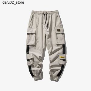 Men's Pants Mens jogging cargo pants hip-hop mens multi pocket sports pants mens jogging street clothing casual mens Trousers harem pants Q240417