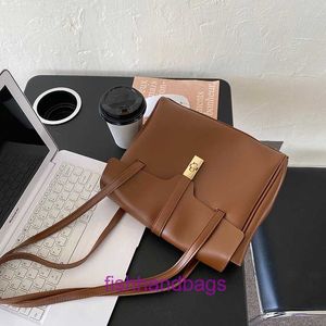 Designer Selinss Sacos de bolsas para mulheres Online Store Couro macio de grande capacidade para trás da moda Bolsa de viagem no outono e inverno com logotipo original G017