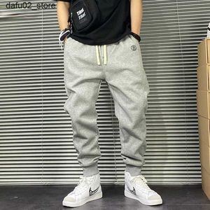 Męskie spodnie w stylu koreańsko-streetwearu luźne spodni sportowe dla męskich odzieży moda hip-hopowe spodnie do joggingu dla mężczyzn Plus w rozmiarze Spodnie joggingowe Q240417