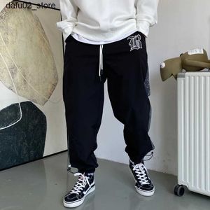 Herrbyxor fashionabla gatukläder casual sportbyxor harajuku patch arbete harem jogging byxor koreanska hip-hop sport jogging byxor herr kläder q240417