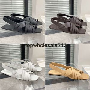 The Row Casual Sandals Ladies Topquality Shoes New 2023 Designer Fashion Retro Leather Flat Bottom Comfortable Roman Woven Hollow Summer Outdoor Beach Factory Shoe