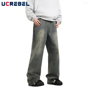 Мужские джинсы царапают вымытые расстроенные джинсовые брюки мужские брюк