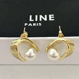 Designer Celiene smycken Celins Saijia 21 Ny oregelbunden böjd pärlaörhängen Kvinnor Avancerat temperament Fransk geometrisk båge