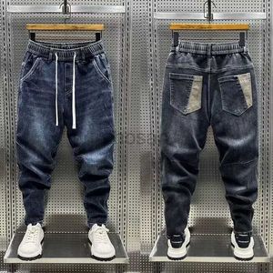 Jeans maschile di alta qualità Nuovo designer di lusso 2024 Luxury Casual Culledstring denim uomini a gamba a tutta lunghezza streetwear pantaloni harem da cowboy d240417