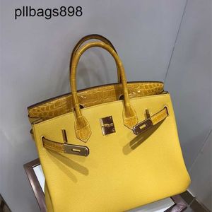 Designer feito à mão 7a Bolsa Bokns Bikns Skin Curty Celly Combinada com Chegamento de Covilhas 30 Pacote Portátil Mulheres Luz Luxo âmbar Ambar Yellowpjfd