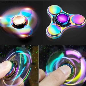 NOVIDADE JOGOS RAVOLBOW FILGET SPINNER TROY METAL METAL UFO Pequeno girador de dedo de dedo presente Crianças adultos girando de ponta de mesa de foco superior Q240418