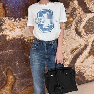 Celinnes T Shirt Designer T Shirt الأزياء الفاخرة النسائية الصيف صيف جديد بالألوان مطبوعة جولة رقبة فضفاضة