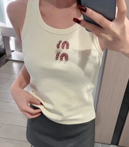 Miumiuss tshirt kvinnor kläder t shirt designer kvinnor sexig halter topp party skörd topp broderad tank topp vår sommaren backless rhinestone sex miumiuss tshirt 300