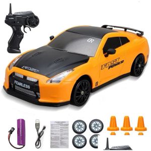 Auto elettricrc auto 24g 4wd rc drift ad alta velocità di ricarica dinamica per bambini remoto di controllo remoto remoto regalo giocattolo per 230612 Drop Deliv