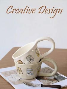 Tazze ahunderjiaz simpatica cartone animato ceramica ceramica caffè creativo grande manico di nicchia set di bevande set con tazze con