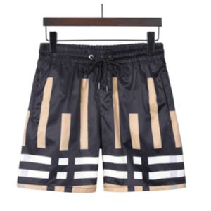 Atacado mass verão casual calça-calça-calça moda moda letra de hip hop impressão calça calça homem homem mulheres shorts multicoloridos shorts soltos cortantas de moletom de moletom m-3xl