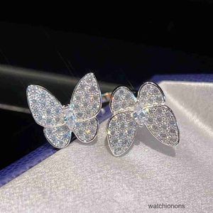 Anel de luxo de ponta Fanjia S925 Silver Pure Full Diamond Double Butterfly Ring For Women Light Fashion Abertura da concha branca intermitente