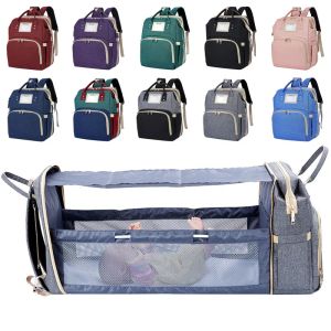 Mochila de fraldas de fraldas de carrinho de carrinho 2021 com troca de bolsas de fralda de cama bolsas de bebê para mamãe viagens portáteis Cama dobrável Mummy Crib Pack