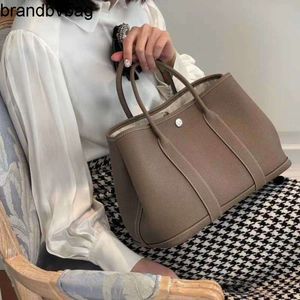 Garden bags Shoulder Party Designer online shop 2023 New Texture Genuine Leather Bag Large Capacity Portable Water Bucket One Crossbody Have Real