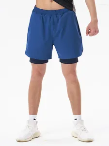 Shorts masculinos masculinos que correm bolsos adequados para esportes fitness noturno correndo anti-balanço de dois andares de secagem rápida exercício de verão Quarter calças