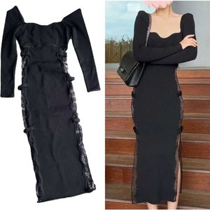 SP Designer Dresses Black Sexy Bow Slit فستان متبكى أنيقة سيدات 2024 فرنسية طويلة الأكمام مزاجية نحيفة تنورة طويلة FZ2404179