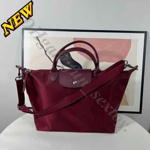 Handväska clearance 95% rabatt på crossbody franska bulle förtjockad pendlare dumpling mode kort handtag enkla kapacitet axelväska stor kvinnor lyx crossbody j9z9