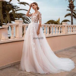 Vestidos de noiva sexy A-line Mangas compridas pescoço alto Apliques de renda oca de lantejoulas varredura comprimento do piso sem traseiro tule lace babados de plus size boho vestidos de casamento plus size