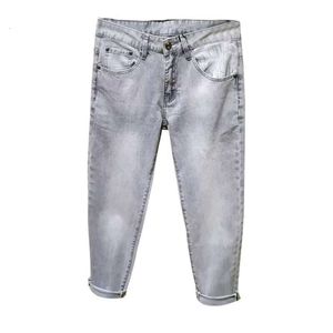 2024 Vår- och höstens trendiga mångsidiga tvättade och slitna smala passade små raka ben jeans