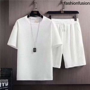 Męskie dresy letnie zestawy mody koreańskie 2 -częściowe swobodne ubrania joggery krańce t -shirtshorts strój 230406