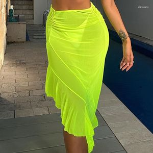 Saias Saias de malha fluorescente assimétrica Salia de praia Sexy cintura alta transparente a biquíni de biquíni de férias de férias de férias