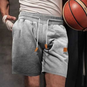 Men's Shorts Fashionable mens pocket gym shorts and sports pants 2024 casual straight pants 2024 summer casual mid rise drawstring shorts J240325