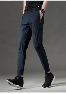 Pantaloni della tuta da allenamento sottile si adattano a jogger comodi a secco rapido uomini che corrono pantaloni lunghi pantaloni sport sport pantaloni zip tascabile 3274479