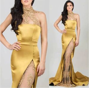 Sexig Gold Mermaid Prom Dresses Long High Neck -paljetter med pärlor Applique Se genom sidodelad kvällsfestklänningar Arabiska kändisklänning 2024