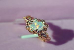 Forma de flor de cor de ouro rosa de ouro inteira Mulheres anéis de dedos brancos Opal cz jóias de moda jóias de mulheres anéis de opala tamanho 610 Bag2631283
