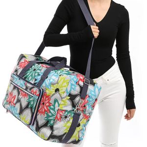 Sacchetti da viaggio pieghevole Donne donne di grande capacità spalla portatile paffone cartone animato borsetti bagagli impermeabili con spalline