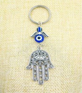 Gioielli di moda Blu Evil Evil Eye Lucky Fatima Hamsa Hand Turkish Evil Eye Charm Gucer Crystas Crystals Car Feng Shui Keychain12530649