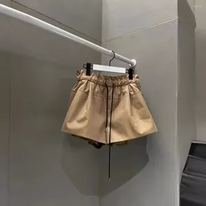 Shorts femininos 2024 primavera na primavera cintura elástica broto de flor placas puxadas corda de guarda -chuva casual moda solta