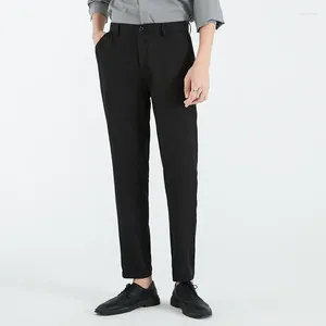 Calça masculina moda de ponta de ponta coreana casual reto cortado botão de retalhos sólidos com zíper de bolso de bolso lixo calças simples