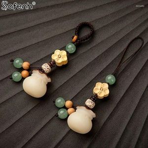 Chaveiros 1pcs Buddhism Lotus Flower Keychain Acessórios de madeira Buda Badis de sorte Tecking Bolsa pendente Chain Chain Buddhist Gift