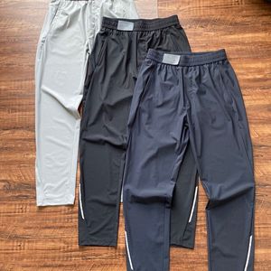 Lu Men Jogger calças longas esportes de ioga de ioga lã bolsos de ginástica calça de moletom calças de corrida mensual elástico elástico fitness