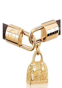 Mode guld armband kvinna man hög kvalitet läder rostfritt stål väska armband par toppkvalitet smycken med box3229410