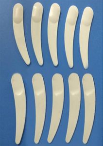 Whole200pcs New Mini Cosmetic Spatula Scoop Disposable Mask White Plastic Spoon Makeup Maquillage Tools8469403