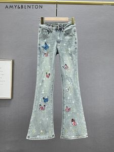 Kvinnors jeans koreanska mode blossade byxor våren hög midja smala kvinnor europeiska varor diamant broderad slut retro baggy