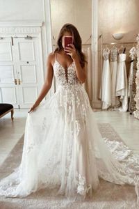 Fantastyczne koronkowe tiulowe sukienki ślubne 2024 Letnia bohemijskie suknie ślubne plus koronkowe aplikacje Spaghetti Buho Suknie ślubne BC11295