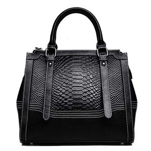 2024 Kvinnor fashionabla och minimalistiska kohud enskild axel diagonal straddle väska handväska äkta läder