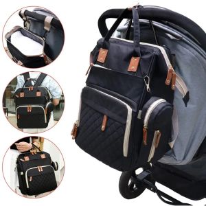 Bolsas novas bolsas de fraldas com estação de mudança de grande capacidade Viajar Backpack Backpack Sacos de fraldas dobráveis com porta de carregamento USB de berço